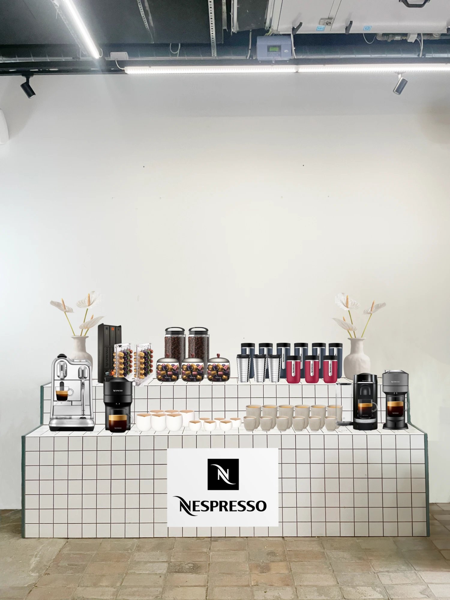 Nespresso stand with coffee machines and capsules