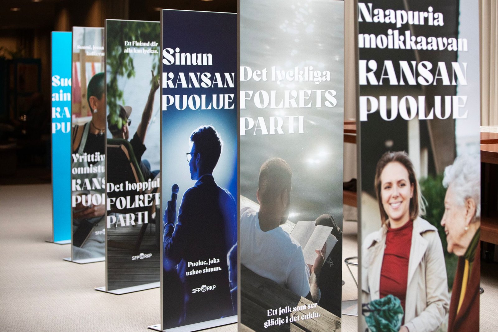 Campaign posters lined up on display, different angle